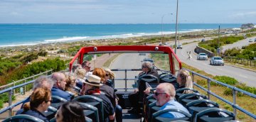 An open-air double-decker bus